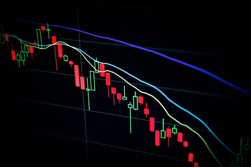 Close-up of financial charts and a notebook